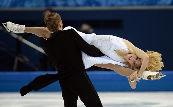 Lithuania’s Deividas Stagniunas and Lithuania’s Isabella Tobias perform in the Figure Skating Ice Dance Short Dance at the Iceberg Skating Palace during the Sochi Winter Olympics on February 16, 2014. (Yuri Kadobnov/AFP/Getty Images)
