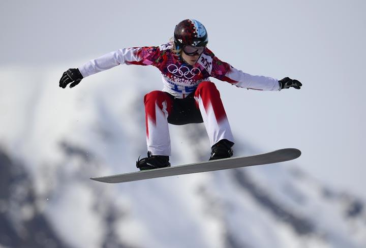 Canada’s Dominique Maltais competes in the Women’s Snowboard Cross seeding runs at the Rosa Khutor Extreme Park during the Sochi Winter Olympics on February 16, 2014. (Javier Soriano/AFP/Getty Images)