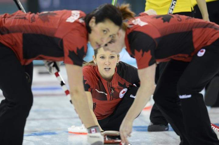 Canada’s Kaitlyn Lawes throws a stone during the Women’s Curling Round Robin Session 12 against South Korea at the Ice Cube Curling Center during the Sochi Winter Olympics on February 17, 2014. (Jonathan Nackstrand/AFP/Getty Images)