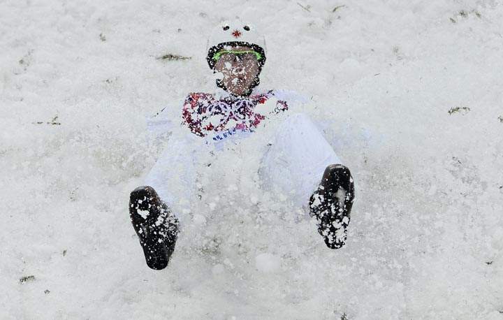 Canada’s Travis Gerrits crashes during the Men’s Freestyle Skiing Aerials qualifications at the Rosa Khutor Extreme Park during the Sochi Winter Olympics on February 17, 2014. (Franck Fife/AFP/Getty Images)