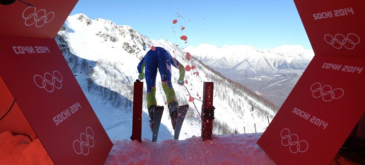 Slovenia’s Klemen Kosi kicks off from the start hut in a men’s downhill training run for the 2014 Winter Olympics, Thursday, Feb. 6, 2014, in Krasnaya Polyana, Russia. (AP Photo/Alessandro Trovati)