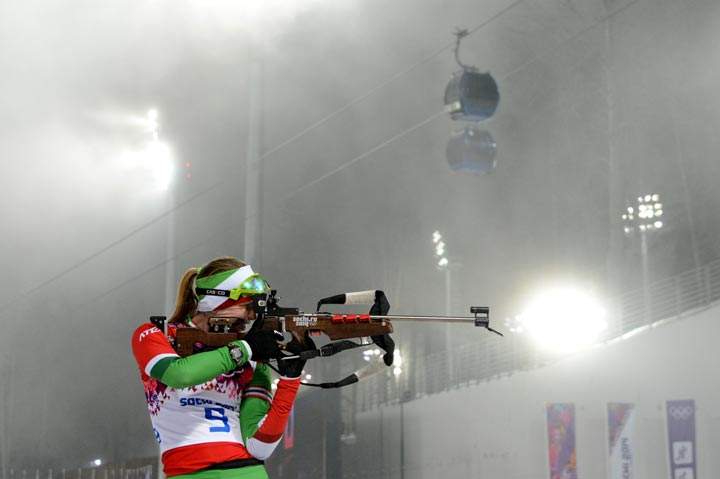 Belarus’ Darya Domracheva shoots at the range as they compete in the Women’s Biathlon 10 km Pursuit at the Laura Cross-Country Ski and Biathlon Center during the Sochi Winter Olympics on February 11, 2014 in Rosa Khutor near Sochi . (Kirill Kudryavtsev/AFP/Getty Images)