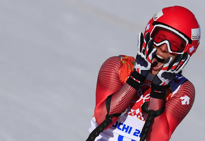 Switzerland's Dominique Gisin reacts after finishing the Women's Alpine Skiing Downhill at the Rosa Khutor Alpine Center during the Sochi Winter Olympics on February 12, 2014. 