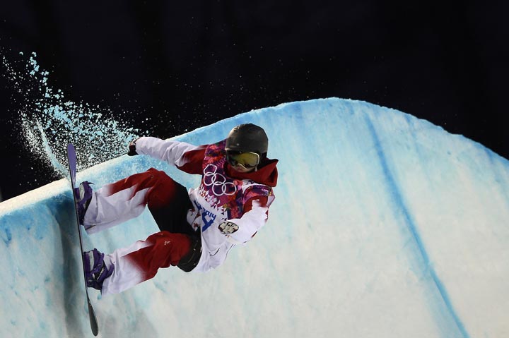 Canada’s Katie Tsuyuki competes in the Women’s Snowboard Halfpipe Semifinals at the Rosa Khutor Extreme Park during the Sochi Winter Olympics on February 12, 2014. (Franck Fife/AFP/Getty Images)