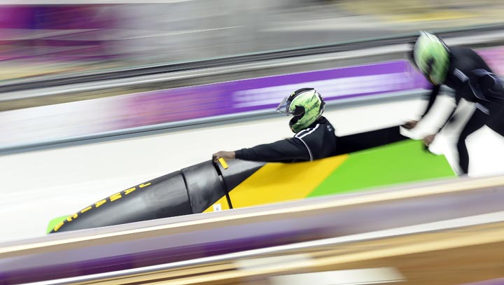 Jamaica-1 two-man bobsleigh steered by Winston Watts takes a practice run at the Sanki Sliding Centre in Rosa Khutor on February 13, 2014 during the 2014 Sochi Winter Olympic Games. (Lionel Bonaventure/AFP/Getty Images)