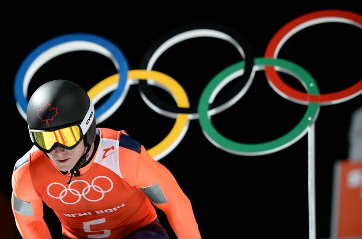 Canada’s Matthew Rowley attends the Men’s Ski Jumping Large Hill second Official training jump at the RusSki Gorki Jumping Center during the Sochi Winter Olympics on February 13, 2014 in Rosa Khutor near Sochi . (Peter Parks/AFP/Getty Images)