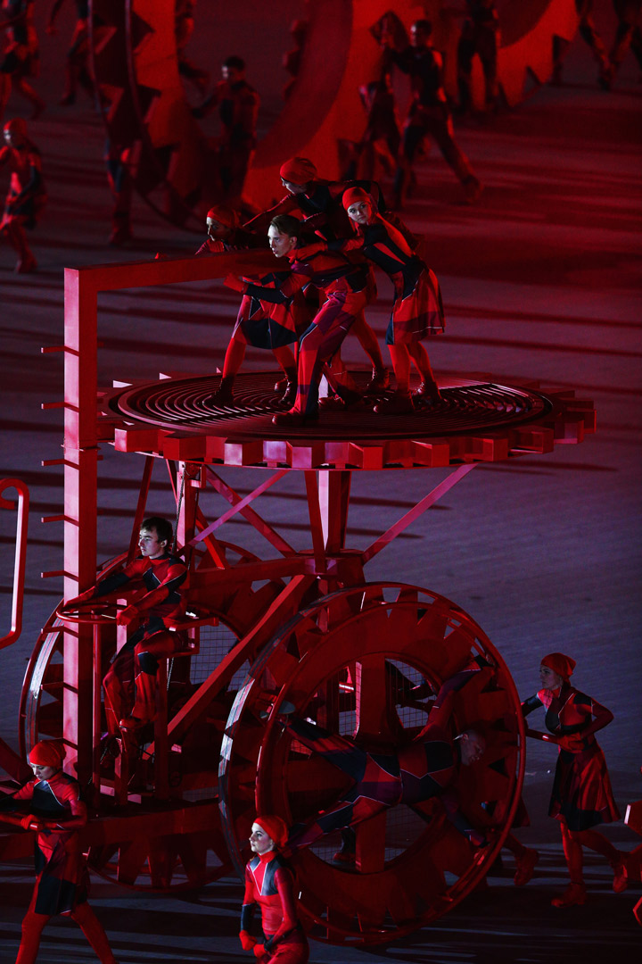 Actors portraying construction workers during the Opening Ceremony of the Sochi 2014 Winter Olympics at Fisht Olympic Stadium on February 7, 2014 in Sochi, Russia.