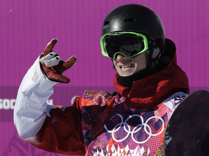 Canada's Maxence Parrot reacts after a run during the men's snowboard slopestyle qualifying at the Rosa Khutor Extreme Park ahead of the 2014 Winter Olympics, Thursday, Feb. 6