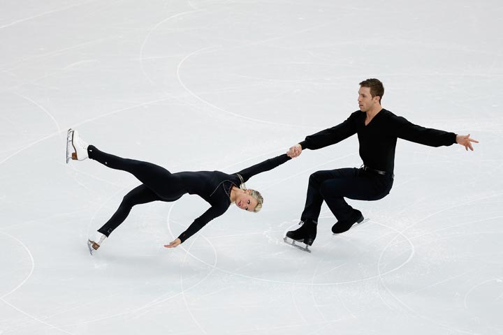 Dylan Moscovitch and Kirsten Moore Towers of Canada practice during Figure Skating Pairs training ahead of the Sochi 2014 Winter Olympics at Iceberg Skating Palace on February 3, 2014 in Sochi, Russia. (Matthew Stockman/Getty Images)