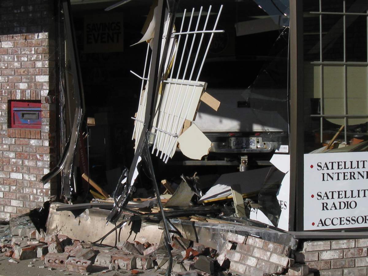 Man smashes pickup truck into store interior - image