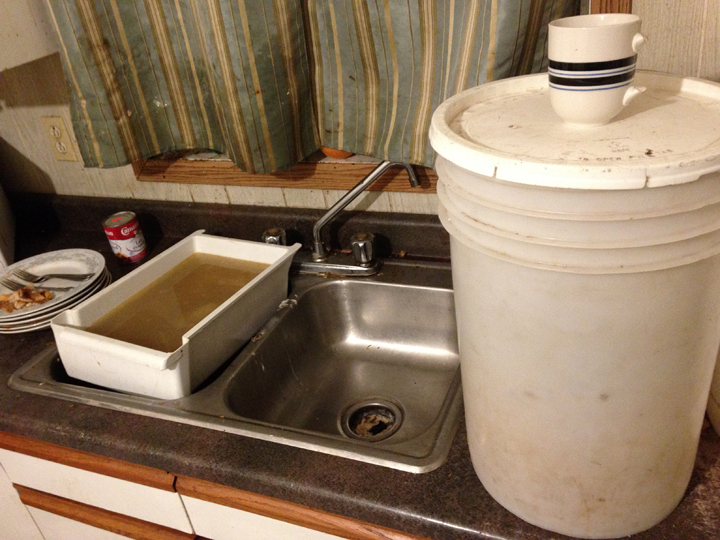 Getting clean drinking water is a daily struggle for thousands of people living on northern Manitoba First Nations reserves. This is what the kitchen sink looks like in a St. Theresa Point home without running water.