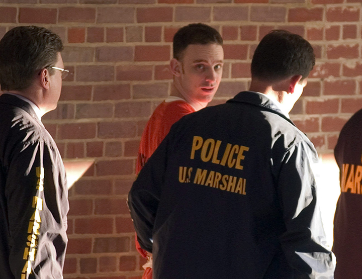 Former 101st Airborne Division Pfc. Steven Dale Green, center, is taken from the court building by US marshals after being sentenced to life in prison Thursday May 21, 2009 in Paducah, Ky.