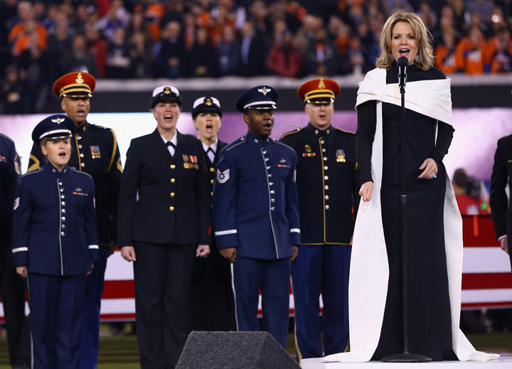Opera singer Renée Fleming signs the national anthem during Super Bowl XLVIII at MetLife Stadium between the Denver Broncos and the Seattle Seahawks on February 2, 2014 in East Rutherford, New Jersey.