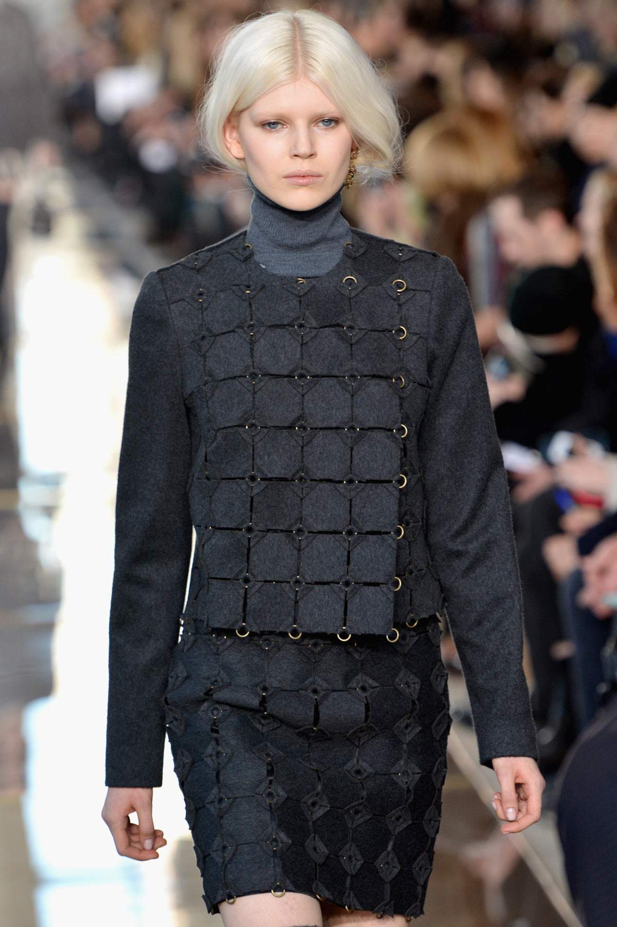 A model walks the runway at the Tory Burch fashion show during Mercedes-Benz Fashion Week Fall 2014 at Avery Fisher Hall at Lincoln Center for the Performing Arts on February 11, 2014 in New York City.