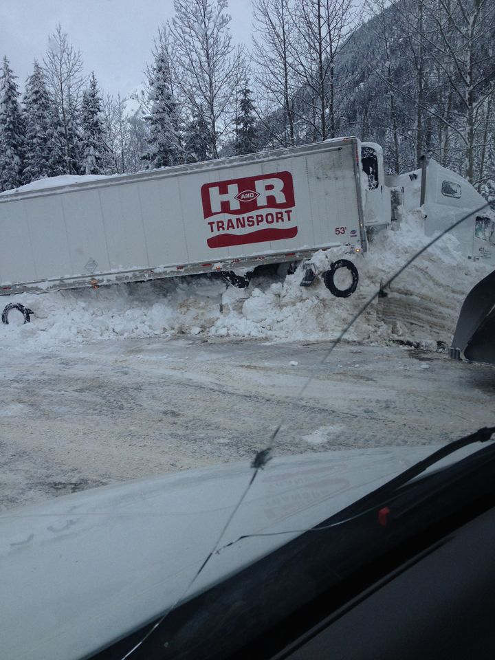 Truck caught in the avalanche Friday night. Credit: BCTrucker.com and @BCTrucker1.