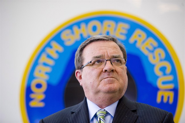 Minister of Finance Jim Flaherty makes an announcement at the North Shore Rescue Base in North Vancouver, B.C. on Friday, February 14, 2014. THE CANADIAN PRESS/Jimmy Jeong.