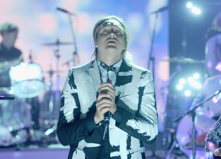 Win Butler performs with Arcade Fire on 'The Tonight Show' on Feb. 20, 2014.