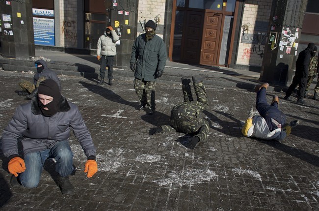 Members of the radical group Pravy Sektor (Right Sector) practice street fighting in central Kiev, Ukraine, Monday, Feb. 3, 2014.