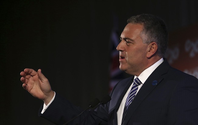 Australia's Treasurer Joe Hockey delivers a closing statement to the media during a press conference at the G-20 Finance Ministers and Central Bank Governors meeting in Sydney, Australia, Sunday, Feb. 23, 2014.(AP Photo/Rob Griffith).