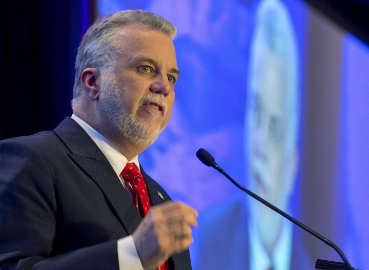 Quebec Liberal Party Leader Philippe Couillard speaks at a Quebec Municipalities meeting, Friday, March 21, 2014 in Quebec City.