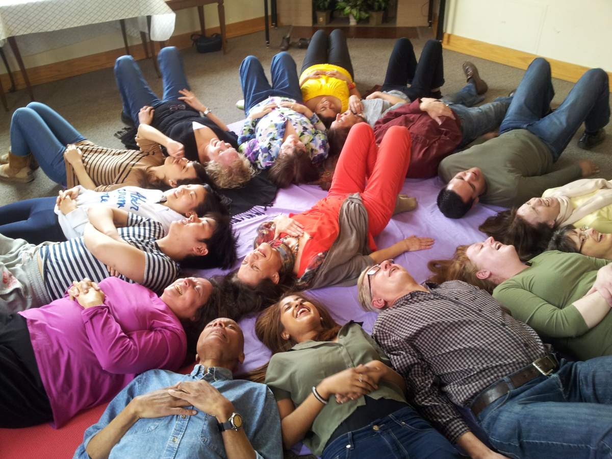 Certified Laughter Yoga Teacher Lynn Himmelmann (middle) laughs her students into happy, healthier lives through weekly, one-hour laughter yoga sessions.