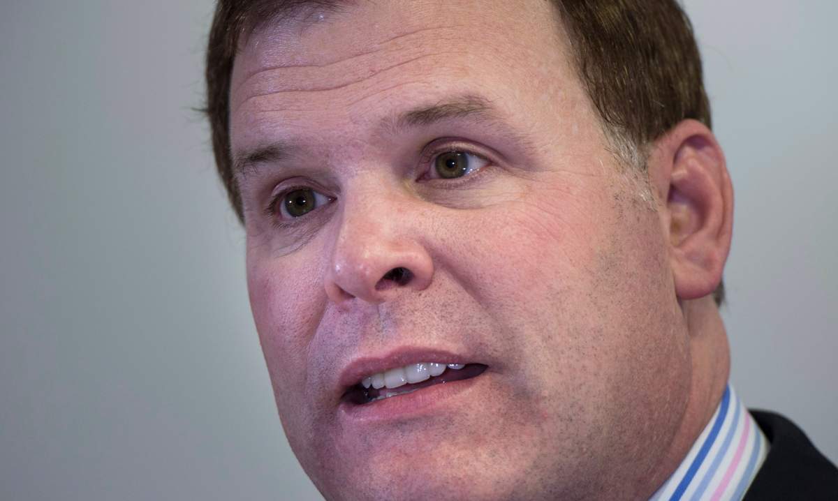 Foreign Affairs Minister John Baird reads a statement regarding the situation in Ukraine, Tuesday, March 18, 2014 in Montreal. THE CANADIAN PRESS/Paul Chiasson