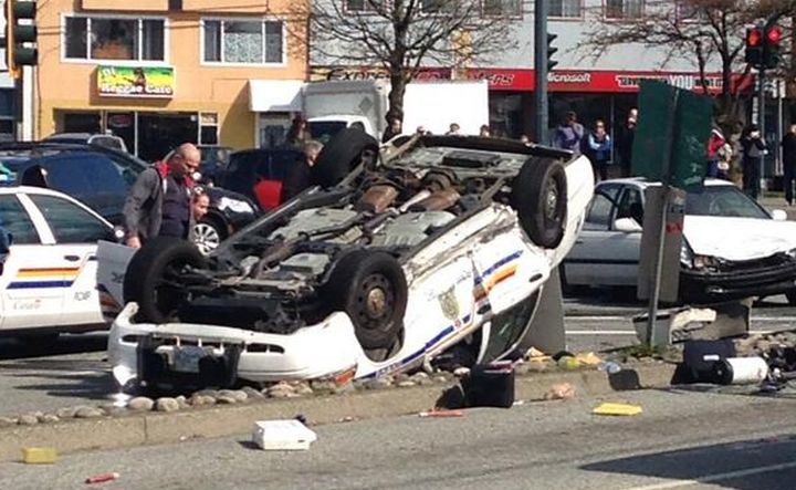 Emergency crews investigate a crash at 108 Avenue and King George Boulevard in Surrey.