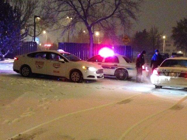 Edmonton police investigate after a taxi cab driver is stabbed, Wednesday, Mar. 26, 2014. 