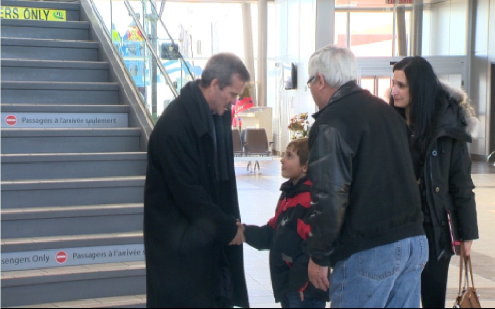 Chris Hadfield greets fans at the Regina airport Friday morning.