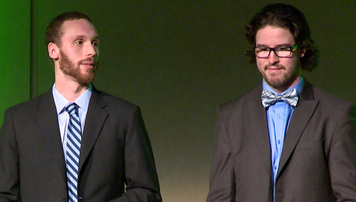 Derek Hulak from the University of Saskatchewan Huskies (l) and Acadia University forward Liam Heelis (r) at the CIS hockey awards in Saskatoon on March 19, 2014. Heelis was named the top hockey player of the year.