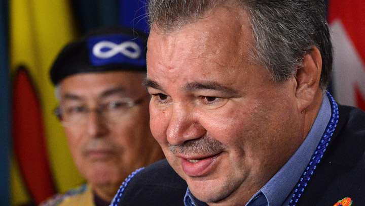 David Chartrand, president of the Manitoba Metis Federation, right, and Clement Chartier, Head of Metis National Council, take part in a press conference on Parliament Hill in Ottawa on Friday March 8, 2013. Bitter infighting over a board meeting has raised tensions among Metis National Council leaders.