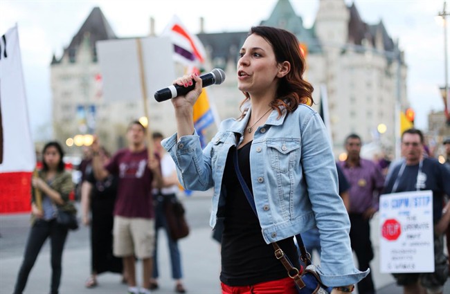 Anne-Marie Roy, president of the Student Federation of the University of Ottawa, speaks at a May Day rally in Ottawa on May 1, 2013. She is speaking out about an online conversation among five fellow students in which she was the target of sexually graphic banter. THE CANADIAN PRESS/HO-Bew Powless.