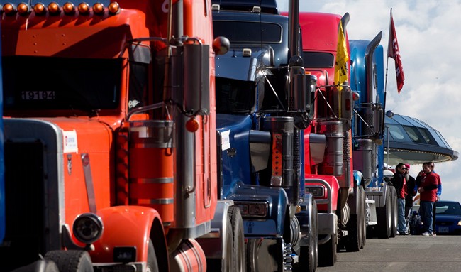 Port truckers reach deal to end strike | Globalnews.ca