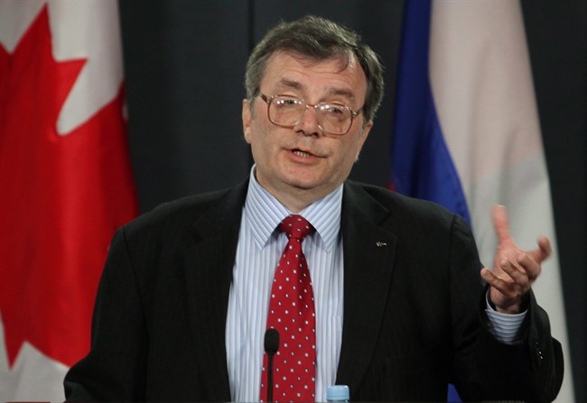 Russian Ambassador to Canada Georgiy Mamedov gestures during a briefing in Ottawa, Monday March 30, 2009.
