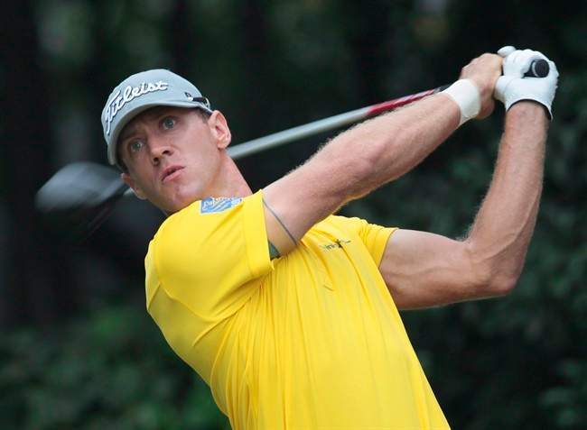 Graham DeLaet of Canada tees off on the 5th hole during the third round of the HSBC Champions golf tournament at the Sheshan International Golf Club in Shanghai, China, Saturday, Nov. 2, 2013. DeLaet won’t be so much in awe of Augusta National Golf Club when he makes his Masters debut next month. THE CANADIAN PRESS/AP