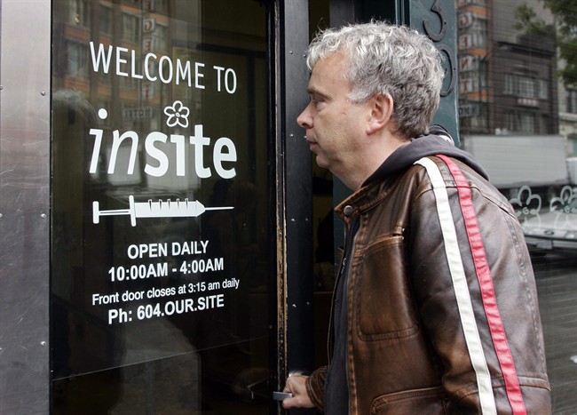FILE PHOTO: Marc Townsend, manager of the Portland Hotel Society, enters Insite in Vancouver on October 2, 2007.