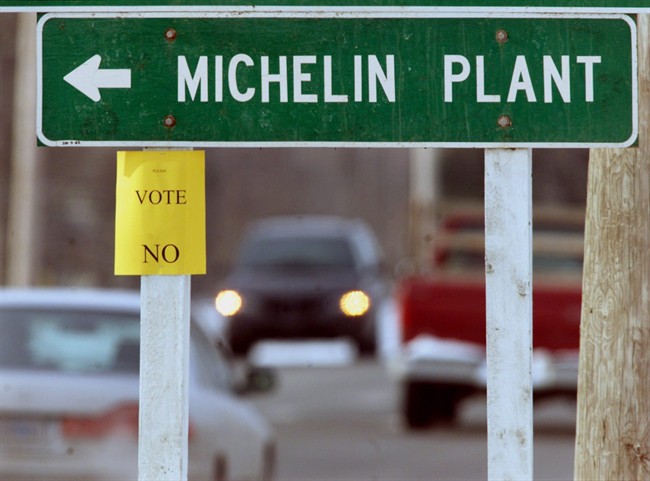A sign points toward a Nova Scotia Michelin plant in Waterville, N.S on on Jan. 4, 2000. 