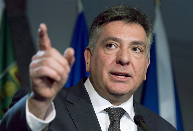 Ontario Finance Minister Charles Sousa on December 16, 2013 in Chelsea, Que. THE CANADIAN PRESS/Adrian Wyld.