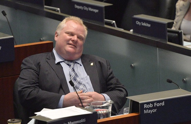 Toronto Mayor Rob Ford sits during a City council meeting May 21, 2013. THE CANADIAN PRESS/Nathan Denette.