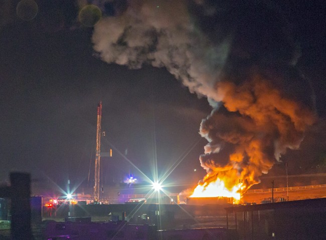 This photo provided by Nathan Hergert shows a fire burning at a oil and gas drilling site near Greeley, Colo., on Tuesday, March 4, 2014. 