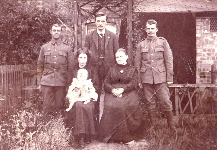 (Back row) unknown, Percy Buck, brother Ted Buck, (front) wife Bertha and son Cyril, Bertha's mother.