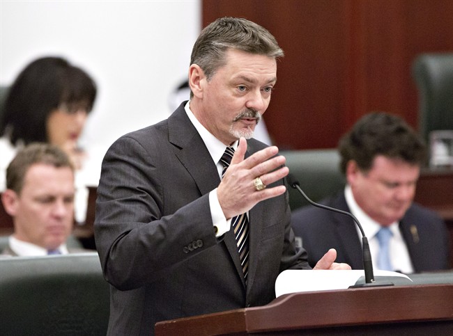  Doug Horner delivers the 2014 budget in Edmonton, Alberta on Thursday March 6, 2014. THE CANADIAN PRESS/Jason Franson.