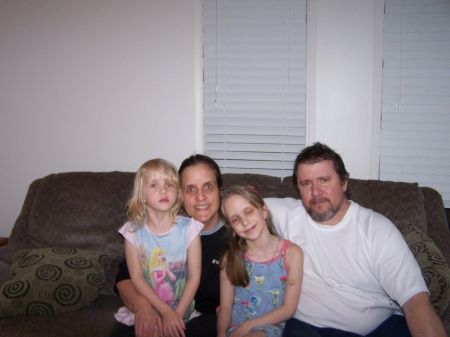 Ghislaine Moreault and Eric Cote with their daughters.