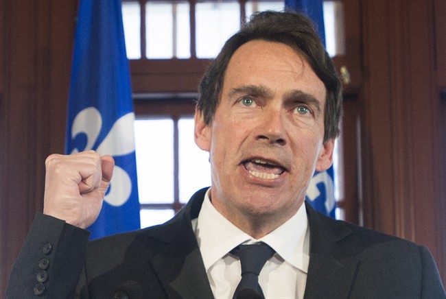 Pierre Karl Péladeau gestures during a press conference in Saint Jerome, Que., Sunday, March 9, 2014. Péladeau has announced his candidacy for the riding of Saint Jerome for the Parti Quebecois on day five of the Quebec provincial election