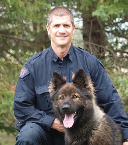 Cpl. Gord Rutherford and Clive are credited with saving a man's life.