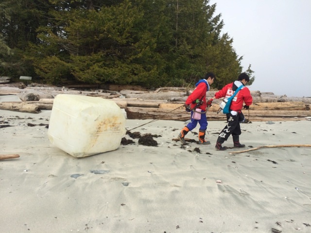 A group of Japanese students help with tsunami debris cleanup on Vancouver Island.