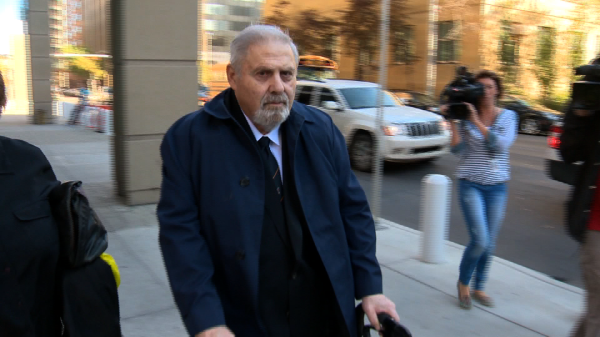 Aubrey Levin leaves a courtroom in downtown Calgary.