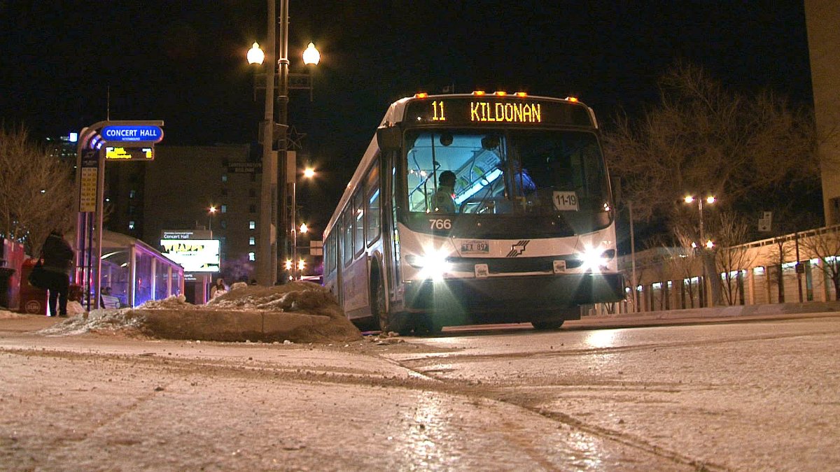 A woman was rushed to hospital after being hit by a Transit bus early Saturday morning.