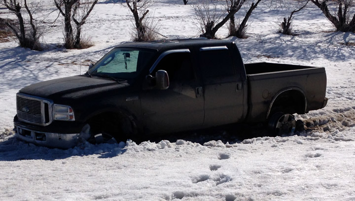 A wild police chase in Manitoba and Saskatchewan came to an end 30 minutes after a spike belt blew-out three tires on a stolen truck from Saskatoon.