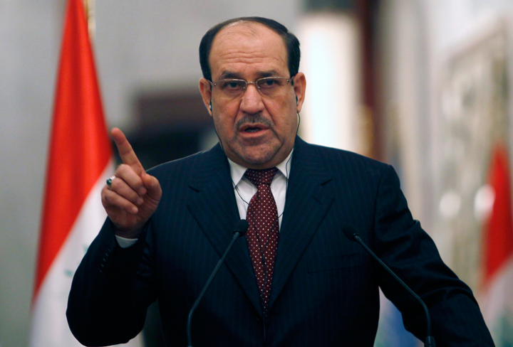 Prime Minister Nuri al-Maliki gives a joint press conference with United Nations Secretary-General Ban Ki-Moon (unseen) in Baghdad about the situation in Iraq and Syrian on January 13, 2014.